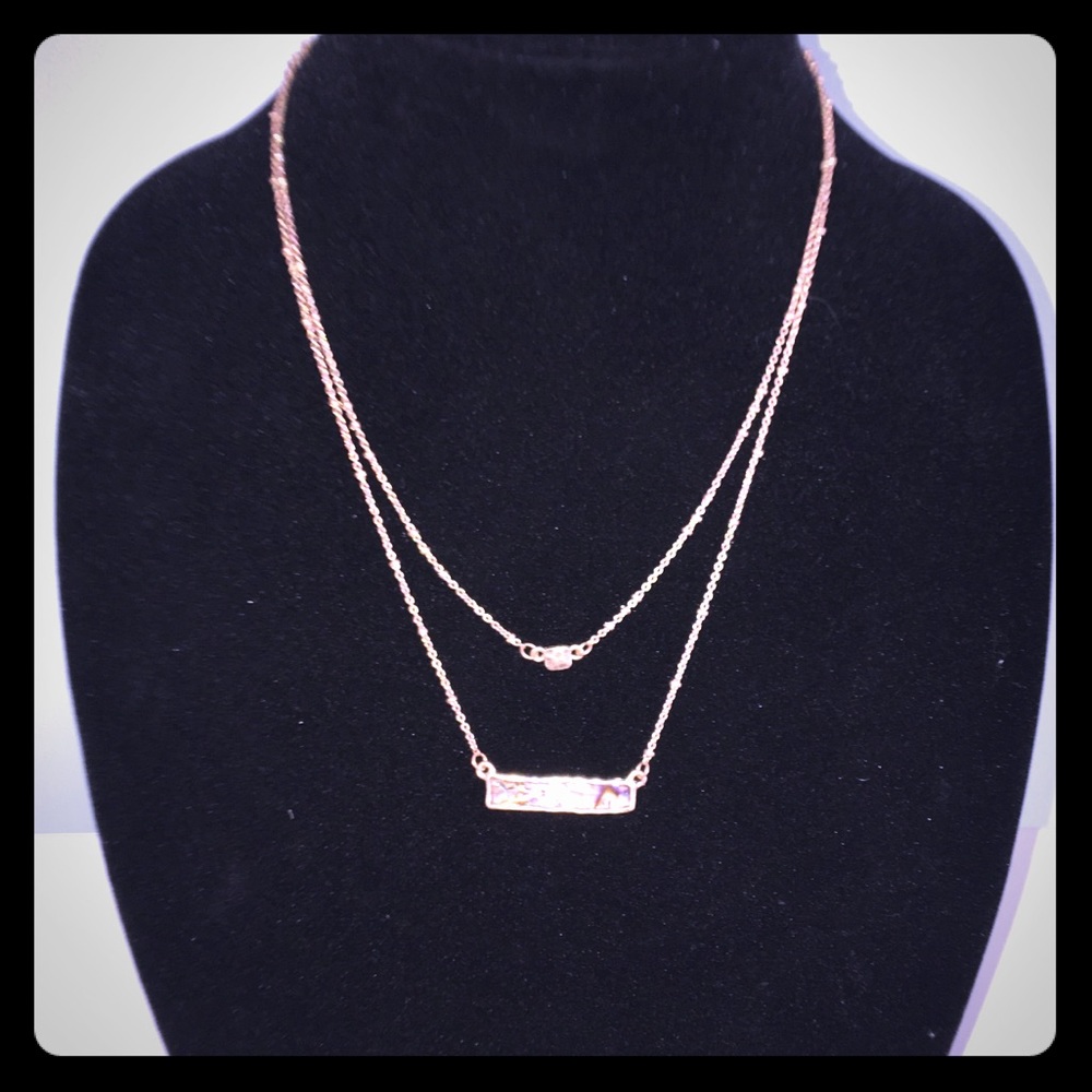 Gold tone choker with slate colored insert